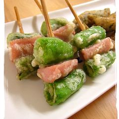 A picture of Shishito Peppers and Fish Sausage Tempura.