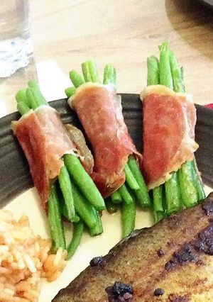 A picture of Beans Wrapped In Serrano Ham.