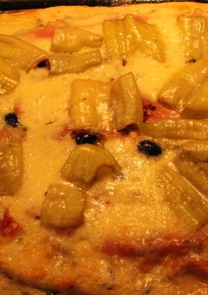 Una foto de Pizzas; Escudo de don Roque y Globo de historieta