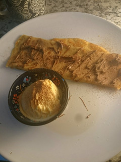 A picture of Cappuccino and hazelnut butter crepe 🍵.