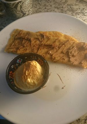 A picture of Cappuccino and hazelnut butter crepe 🍵.