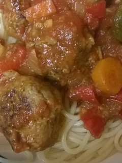 A picture of Meatballs with Tomato Vegetable Sauce.