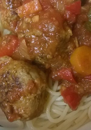 A picture of Meatballs with Tomato Vegetable Sauce.