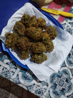 Una foto de Buñuelos de espinaca y cebolla de verdeo