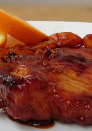 A picture of Pork Chop In Orange Sauce.