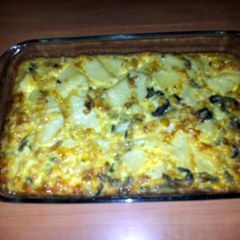 A picture of Eggs, potatoes and onions.