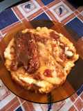 Polenta con tuco de costillas de cerdo