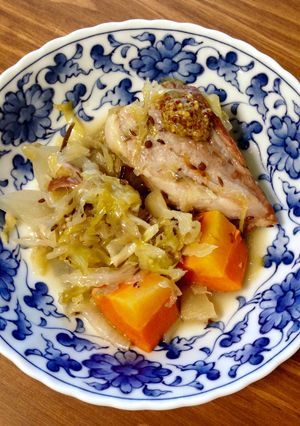 A picture of German-style Braised Pork and Sauerkraut.