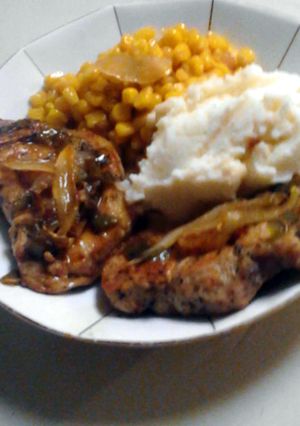 A picture of Lavish Pork Chops With Candied Onions.