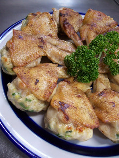 A picture of Not to the Brim but...Stuffed Chicken Wing Gyoza.