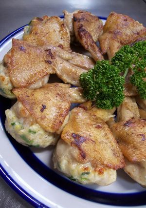 A picture of Not to the Brim but...Stuffed Chicken Wing Gyoza.