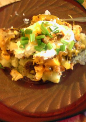 A picture of smoked grill chicken bake potatoe.