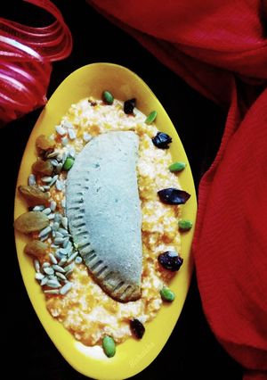 A picture of Baked Kuttu Gujiya in Papaya Rabdi.
