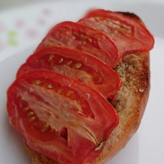 A picture of Bread And Butter With Hazelnut Top Tomato.