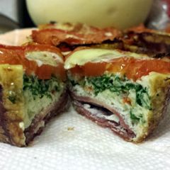 A picture of Healthy Cupcake Omletes - w baby Kale & turkey bacon..