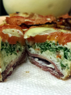A picture of Healthy Cupcake Omletes - w baby Kale & turkey bacon..