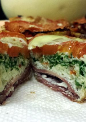 A picture of Healthy Cupcake Omletes - w baby Kale & turkey bacon..