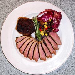 A picture of Duck Breasts with Concord Sauce.