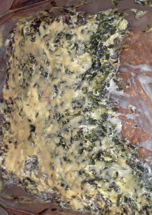 A picture of spinach and artichoke casserole.