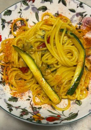 A picture of One-Pan Spaghetti with Clams, Zucchini, and Saffron.