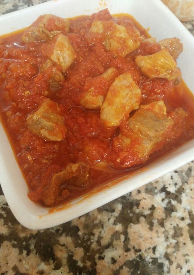 Una foto de Magra con tomate