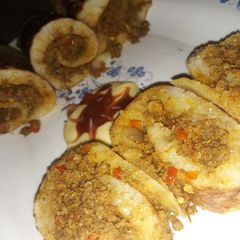 A picture of Sinasir (rice pancake) with minced meat.