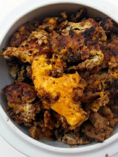A picture of Fried Egg With BBQ Ground Pork.