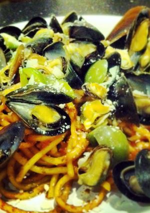 A picture of Italian style Mussels and Pasta.