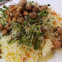A picture of Roasted Garbanzo Beans, Sprouts and Carrot Rice.