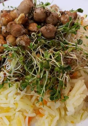 A picture of Roasted Garbanzo Beans, Sprouts and Carrot Rice.