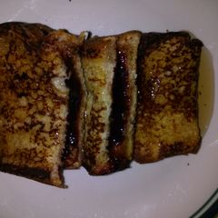 A picture of French toast pudding sandwhich.