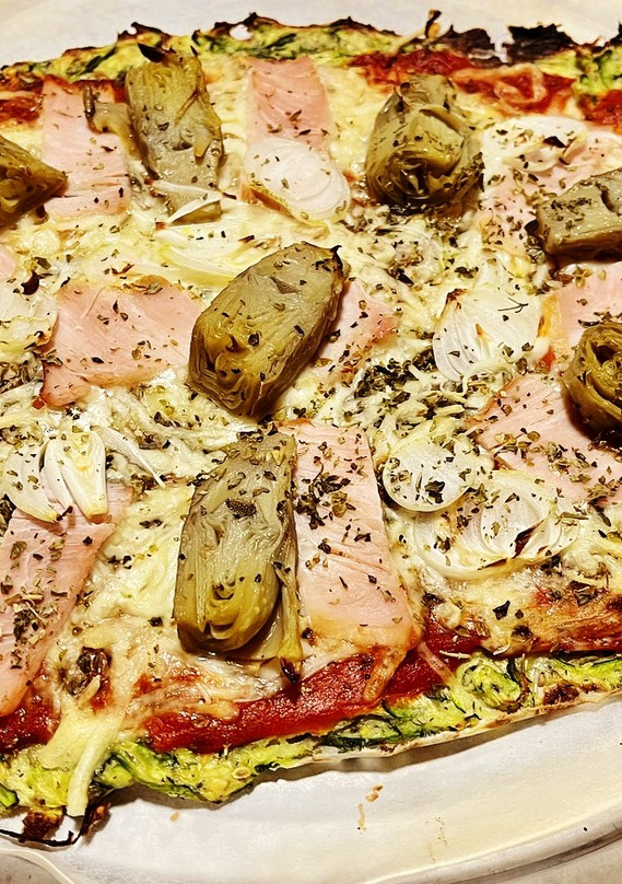 Una foto de Pizza con base de calabacín