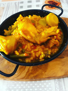 Una foto de Arroz meloso con pollo