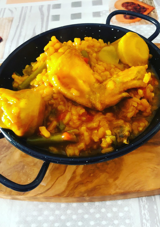 Una foto de Arroz meloso con pollo