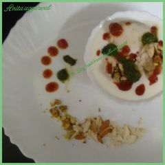 A picture of Dryfruit bread bhalla in yogurt.