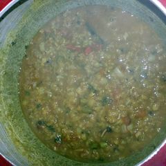 A picture of Masoor Dal (red lentils in Indian spices).