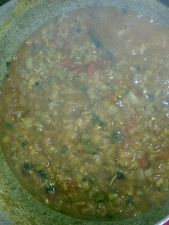 A picture of Masoor Dal (red lentils in Indian spices).