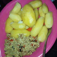 A picture of Irish potatoes and egg sauce.