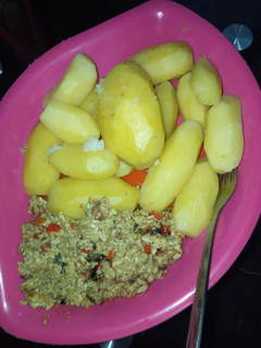 A picture of Irish potatoes and egg sauce.