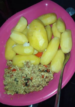 A picture of Irish potatoes and egg sauce.