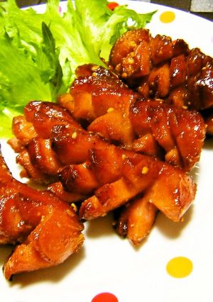 A picture of A Bento Box Gap-Filler! Wiener Sausages with Sauce and Sesame Seeds.
