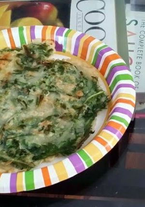 A picture of Korean pancakes with chives and crown daisy.
