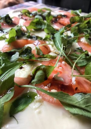 Una foto de Pizza de rúcula