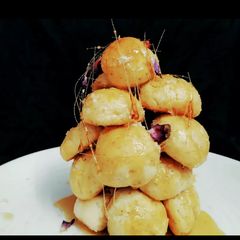 A picture of Lilliputian Eggless Croquembouche.