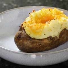 Stuffed Baked Potatoes with bacon and cheddar cheese #potato A picture of Stuffed Baked Potatoes with bacon and cheddar cheese #potato.