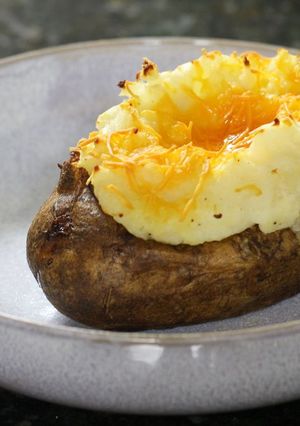 A picture of Stuffed Baked Potatoes with bacon and cheddar cheese #potato.