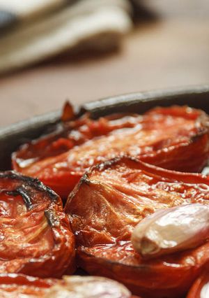 Una foto de Tomates peritas confitados