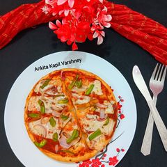 A picture of Capsicum Pizza.