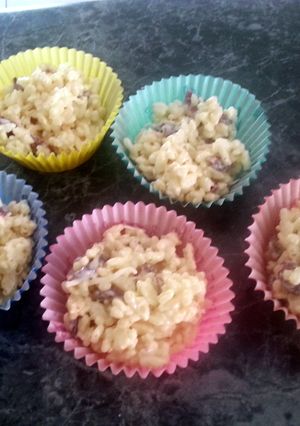 A picture of white chocolate rice bubbles with cranberry and coconut.