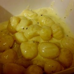 A picture of Creamy, cheesy gnocchi.